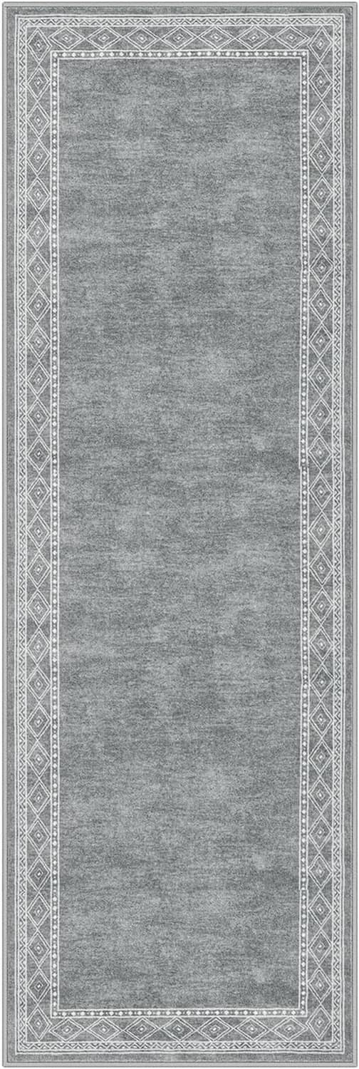 Gray rectangular runner rug with ornate border pattern and slim flat weave