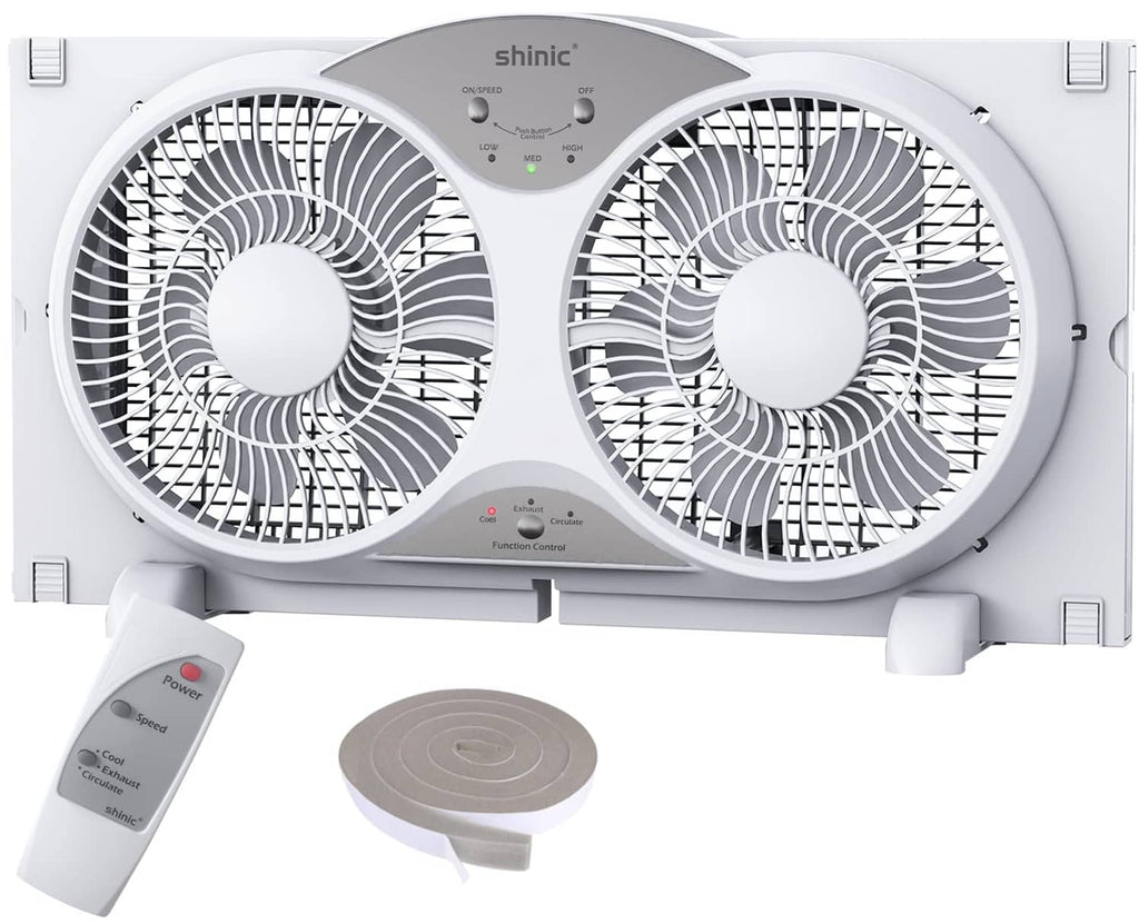 White window fan with twin circular blades, control panel, and included remote