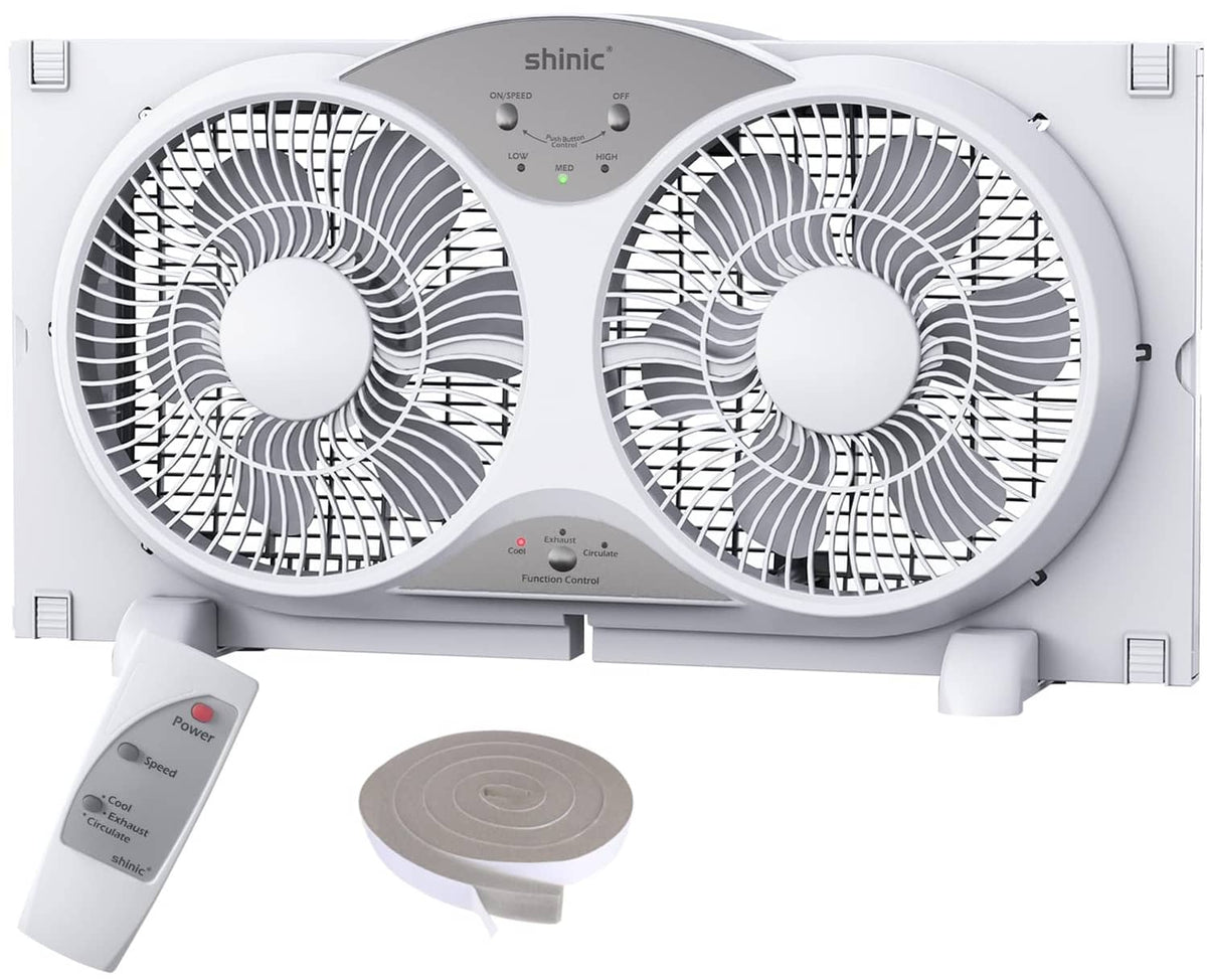 White window fan with twin circular blades, control panel, and included remote