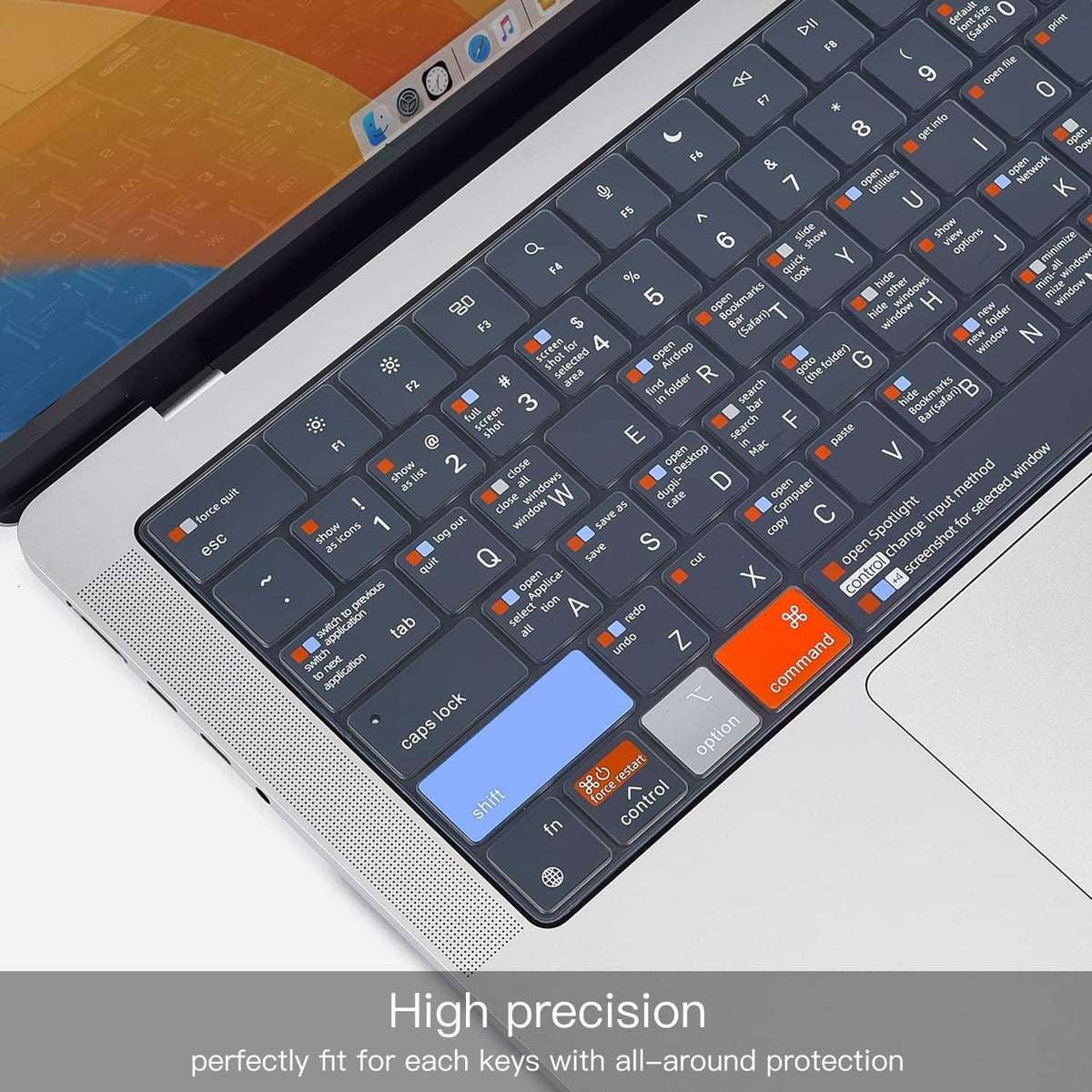 Close-up dark silicone keyboard cover with orange command shortcut labels