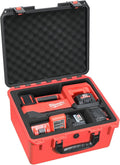 Waterproof hard tool case with black foam insert and red base, open