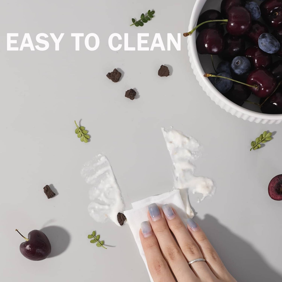 Gray easy-clean silicone mat with raised edge, wipe away messes from the surface