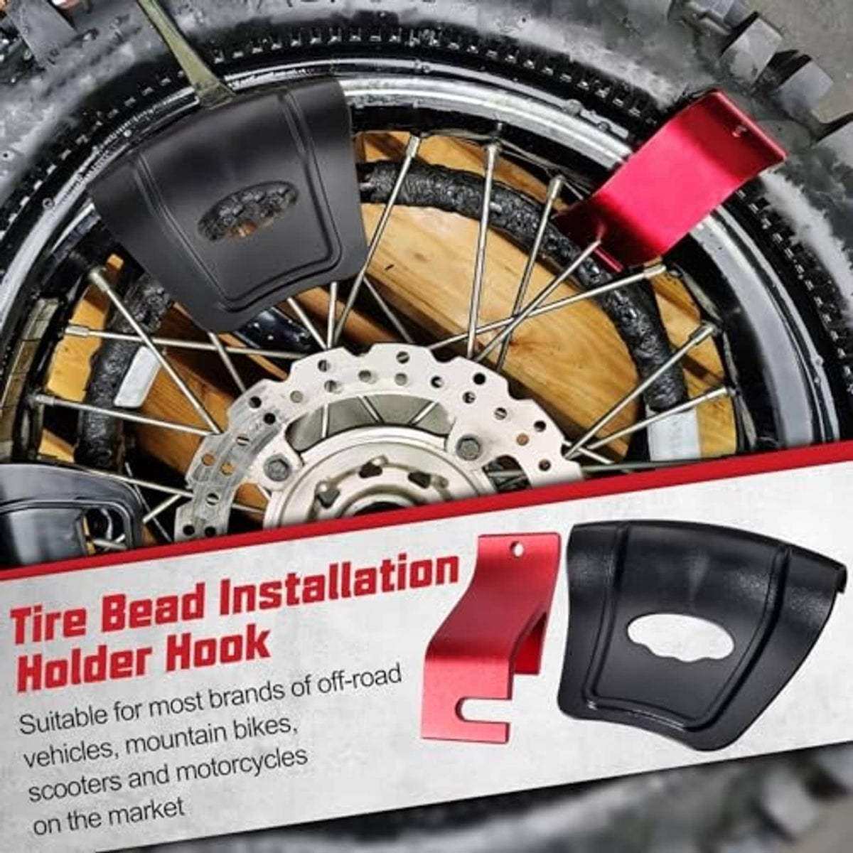 Black rim protector and red tire bead holder hook positioned on a motorcycle wheel