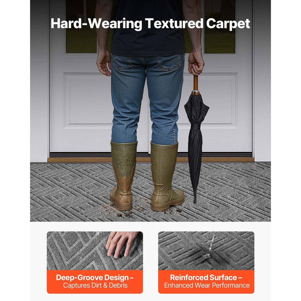 Grey front door mat with deep-groove textured surface and anti-slip backing.