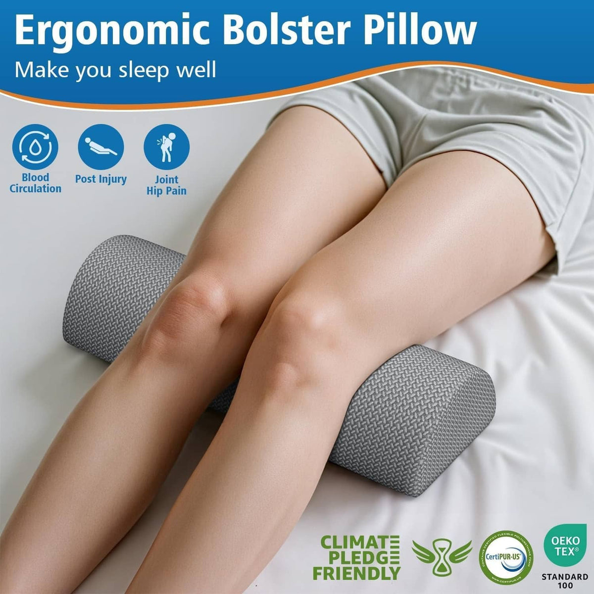 Gray knee bolster pillow placed between knees for side sleeping support