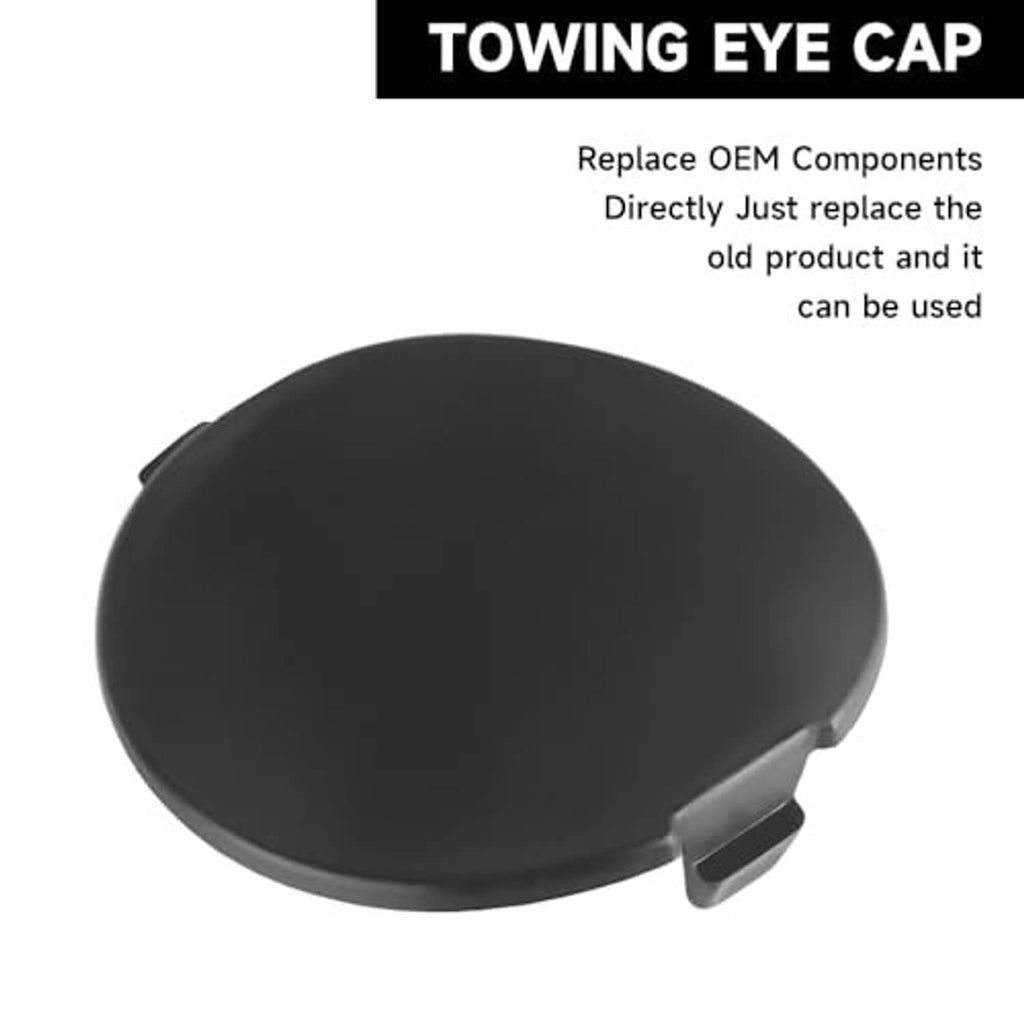 Black towing eye cap cover with protruding latch clip on one edge