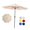 Beige outdoor patio umbrella with open canopy and center pole.