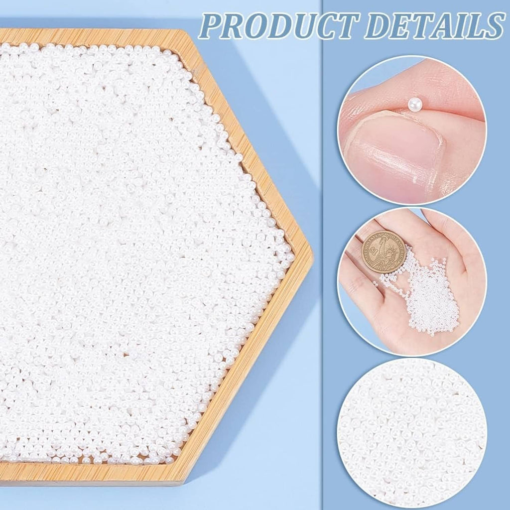 Tray filled with white round pearl beads with close-up details of bead texture