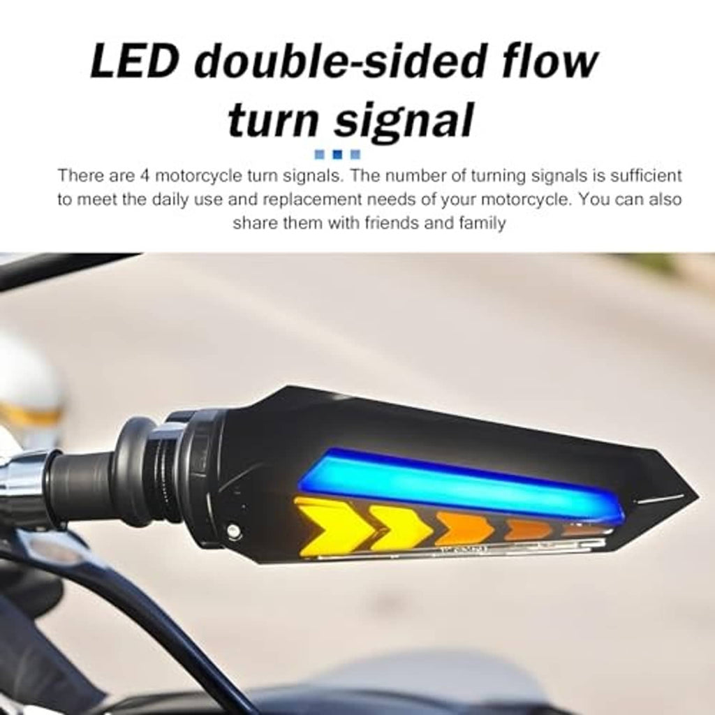 Close-up LED double-sided flow turn signal with black housing and blue/yellow arrow glow