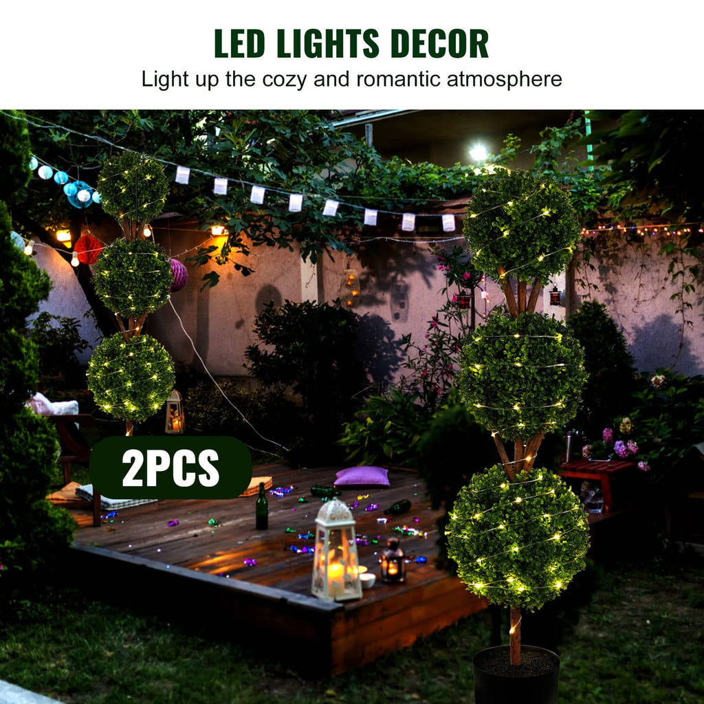 Outdoor LED-lit artificial topiary trees with stacked green foliage in black pots