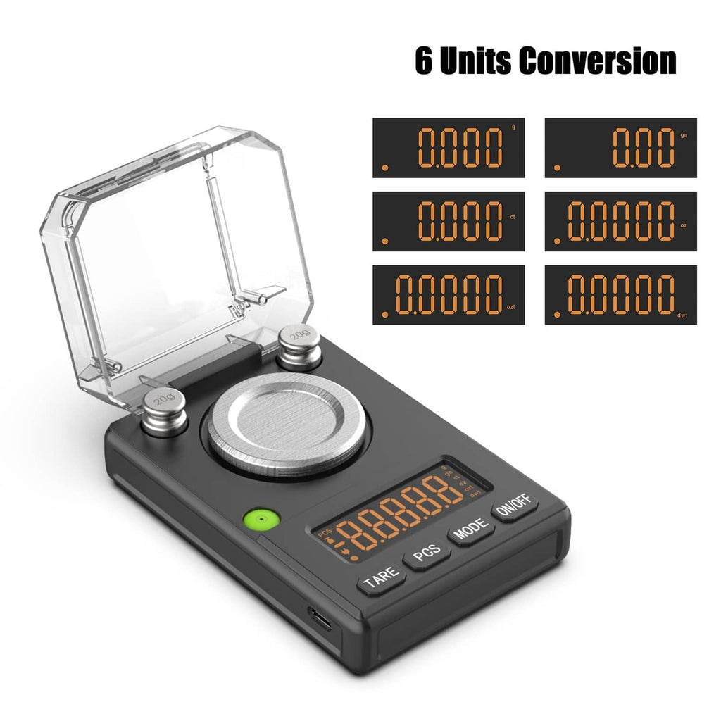 Black milligram scale with open lid, circular platform, and orange LED display