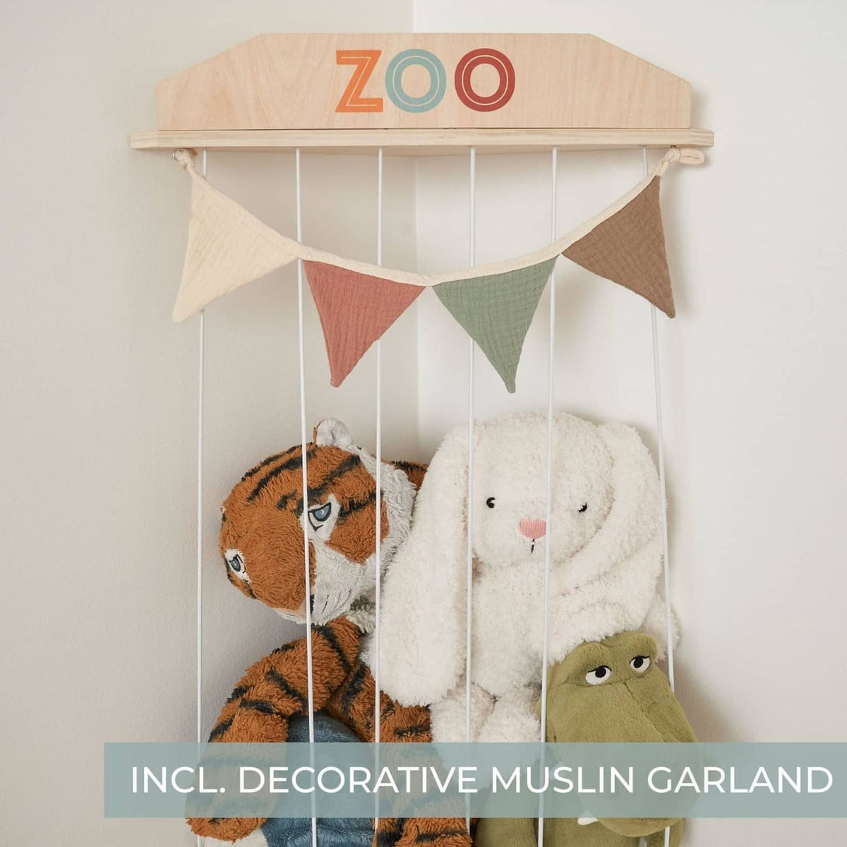 Natural wood top shelf for stuffed animal storage with decorative muslin garland and rope net
