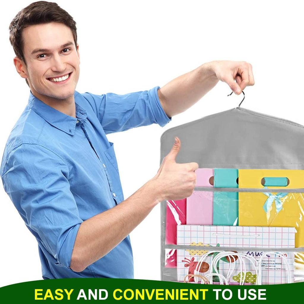 Gray hanging gift bag organizer in use, with multiple clear pockets and top hook.