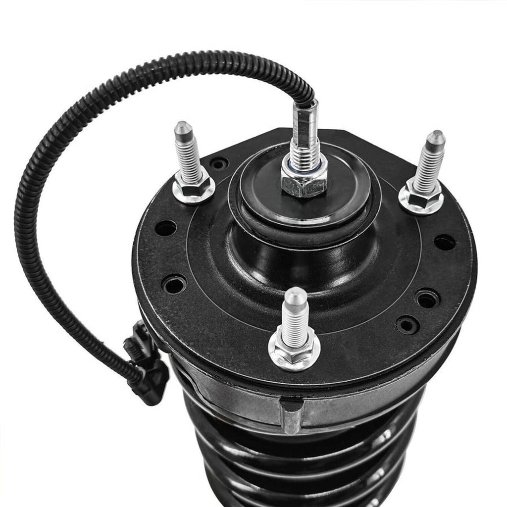 Shock strut top mount plate with rubber bushing and metal bolts