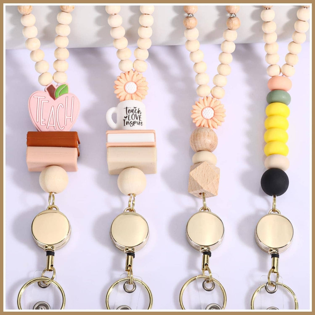 Set of wood bead retractable lanyards with round badge reels and mixed charm colors