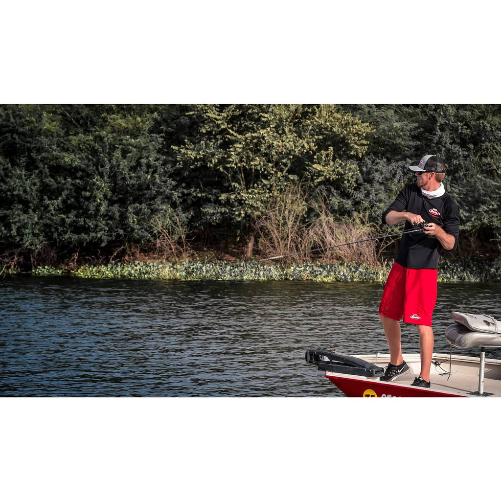 Angler on a boat holding a fishing rod