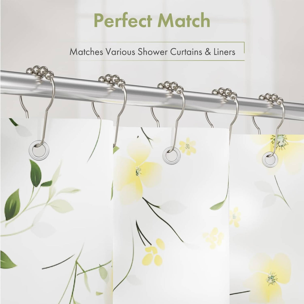 Polished nickel shower curtain hooks lined on a chrome rod with bead accents
