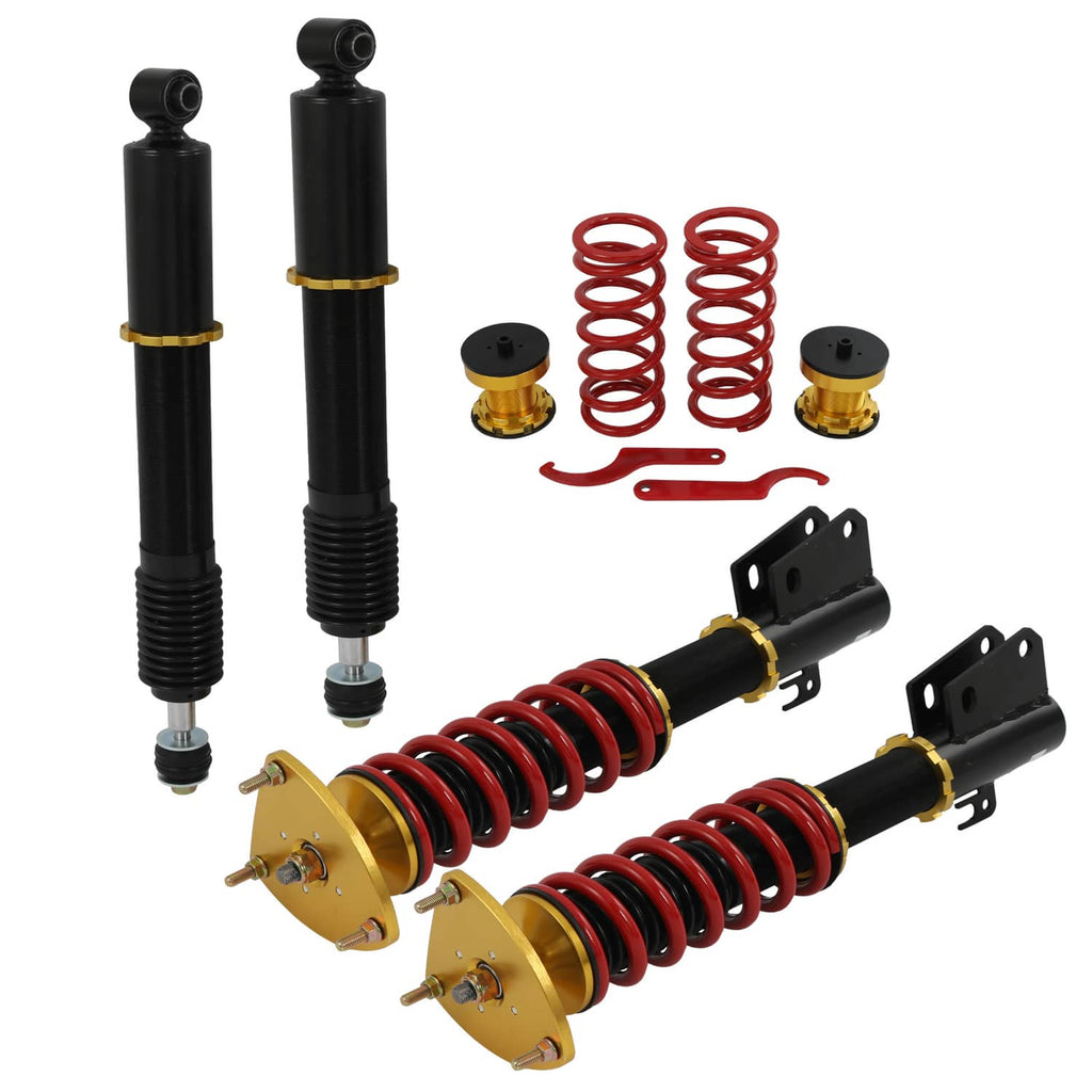 Coilover suspension struts with red coil springs and black shock bodies