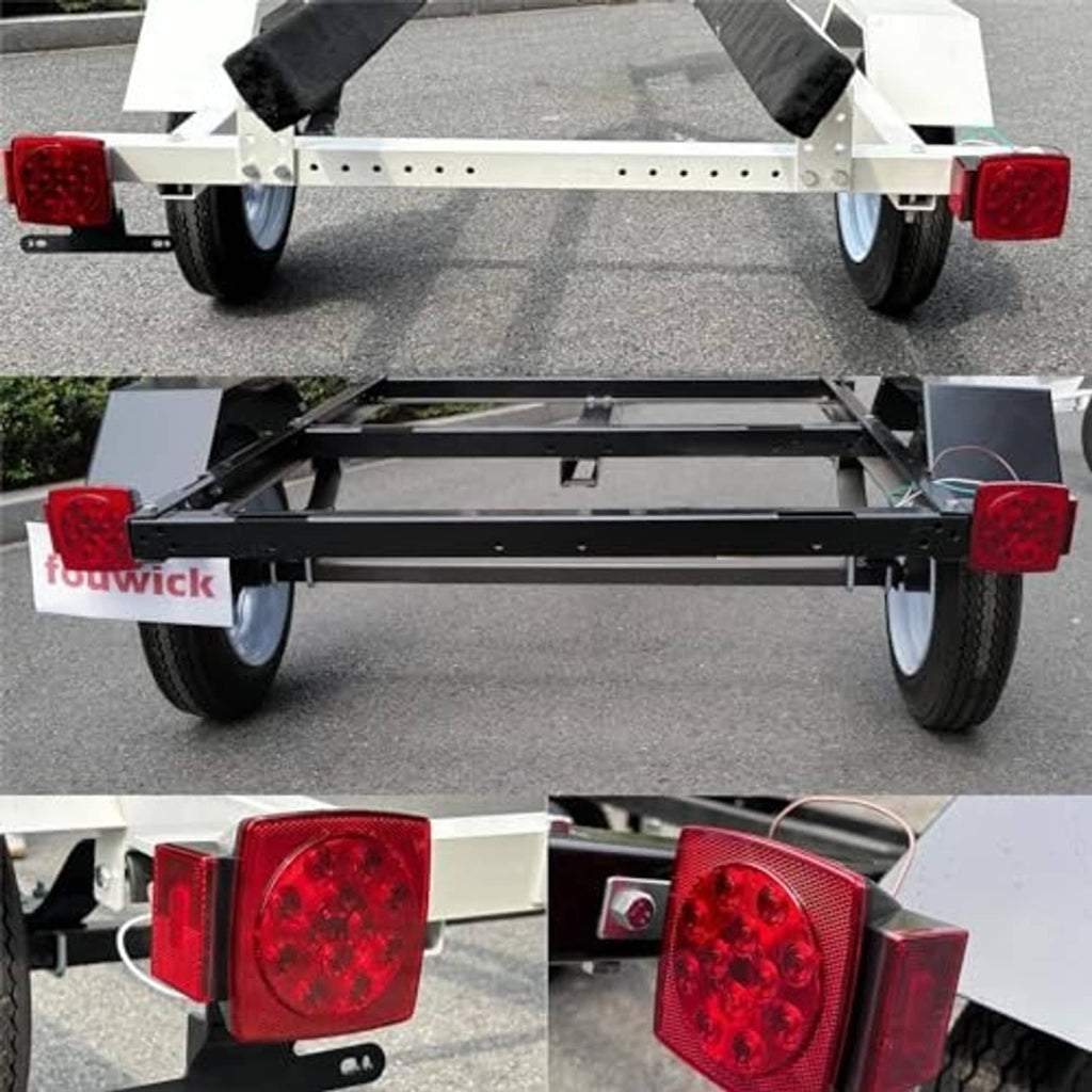 Trailer with red square LED tail marker lights mounted at rear corners on frame brackets