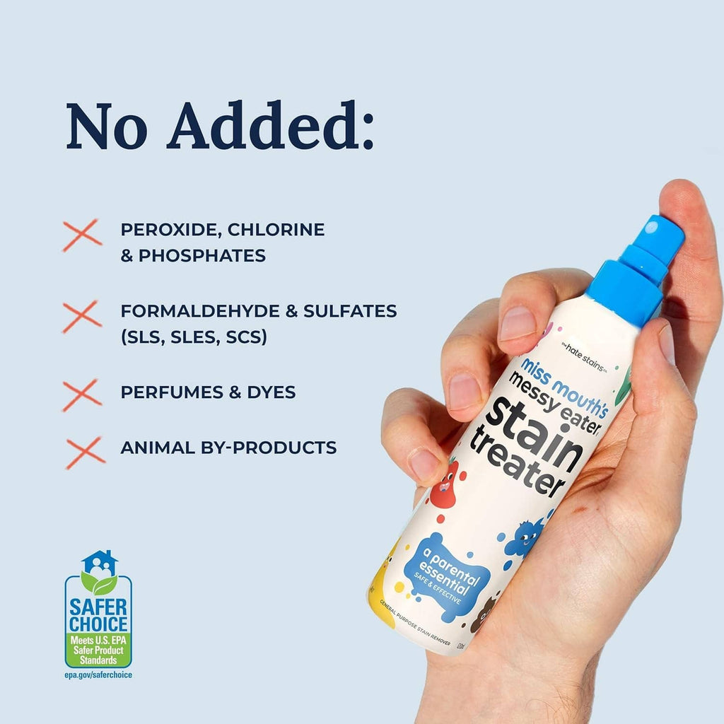 Stain treater spray bottle with blue cap and no-added ingredient symbols