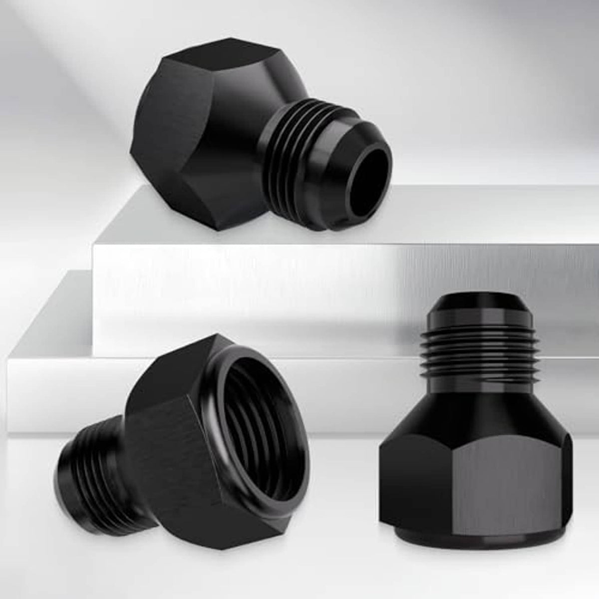 Black aluminum AN hose flare reducer fitting, male threads, hex body