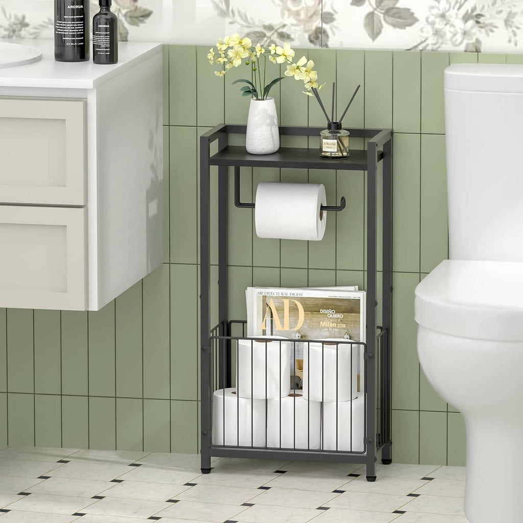 Black freestanding toilet paper holder with top shelf, tissue roll, and lower rack