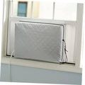 Grey quilted window AC unit cover with elastic straps secured at the right side.
