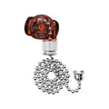 Ceiling pull chain light switch with amber housing and chrome ball chain, plus cap nut