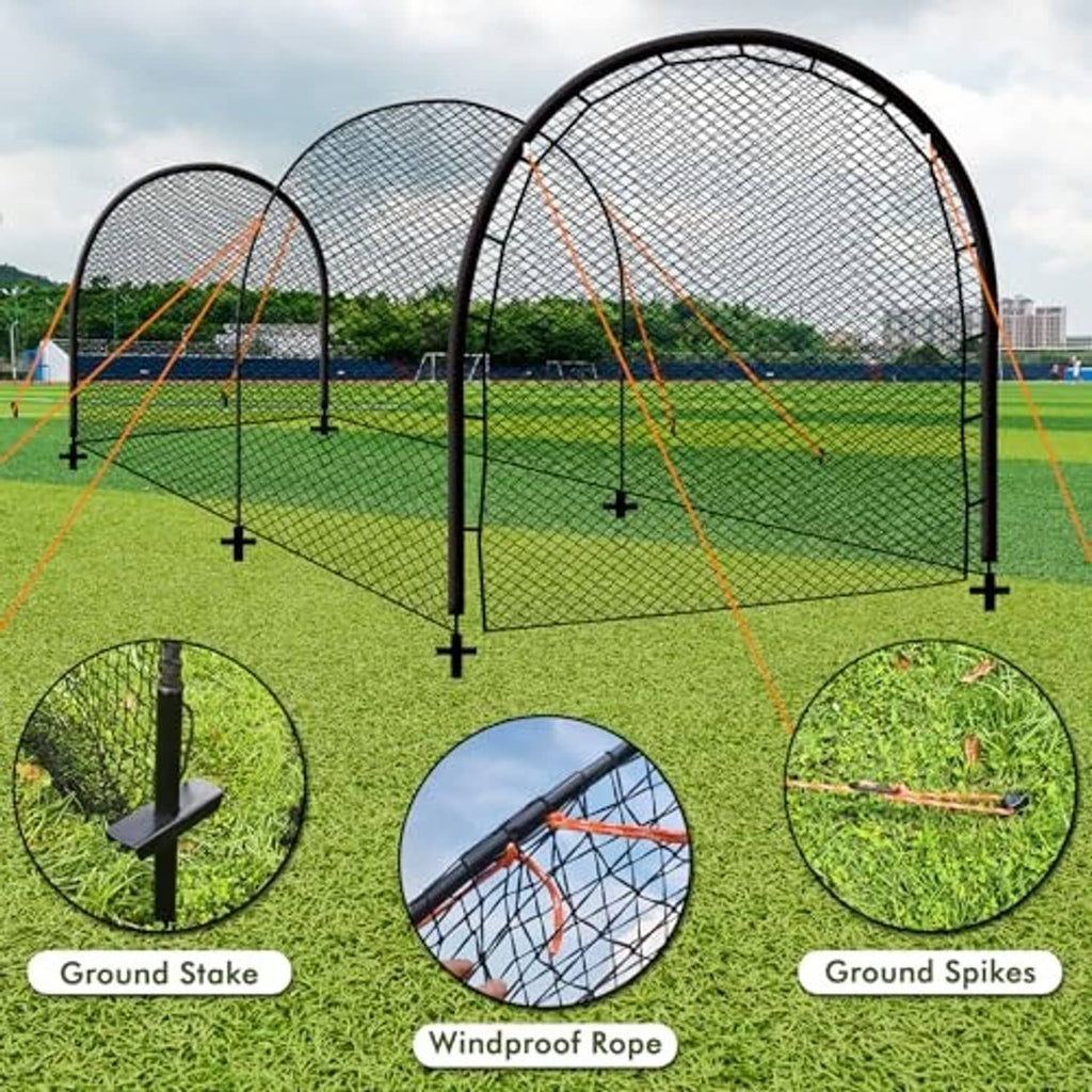 Portable batting cage setup with ground stakes and windproof ropes on grass field