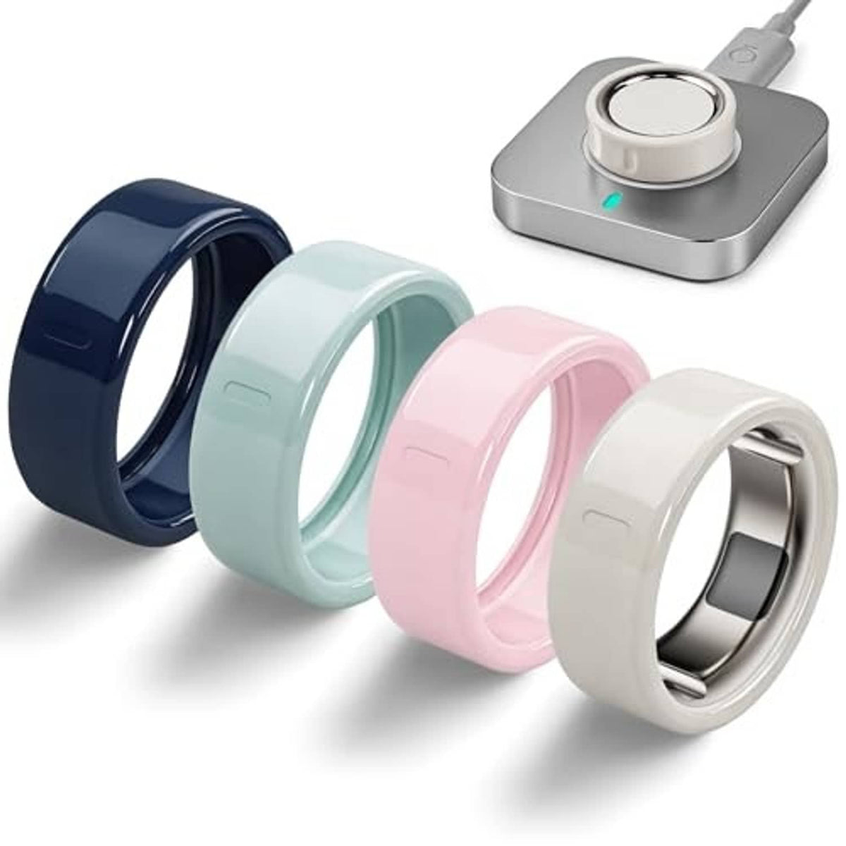 Set of four Oura ring covers in dark blue, mint, pink, and white TPU