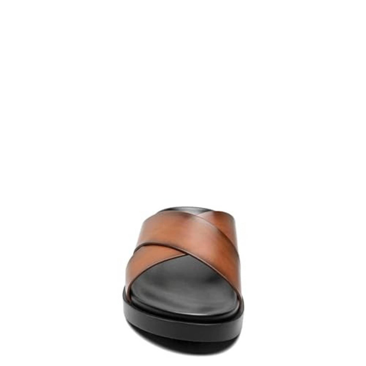 Cognac brown slide sandal heel view with black footbed and cross strap