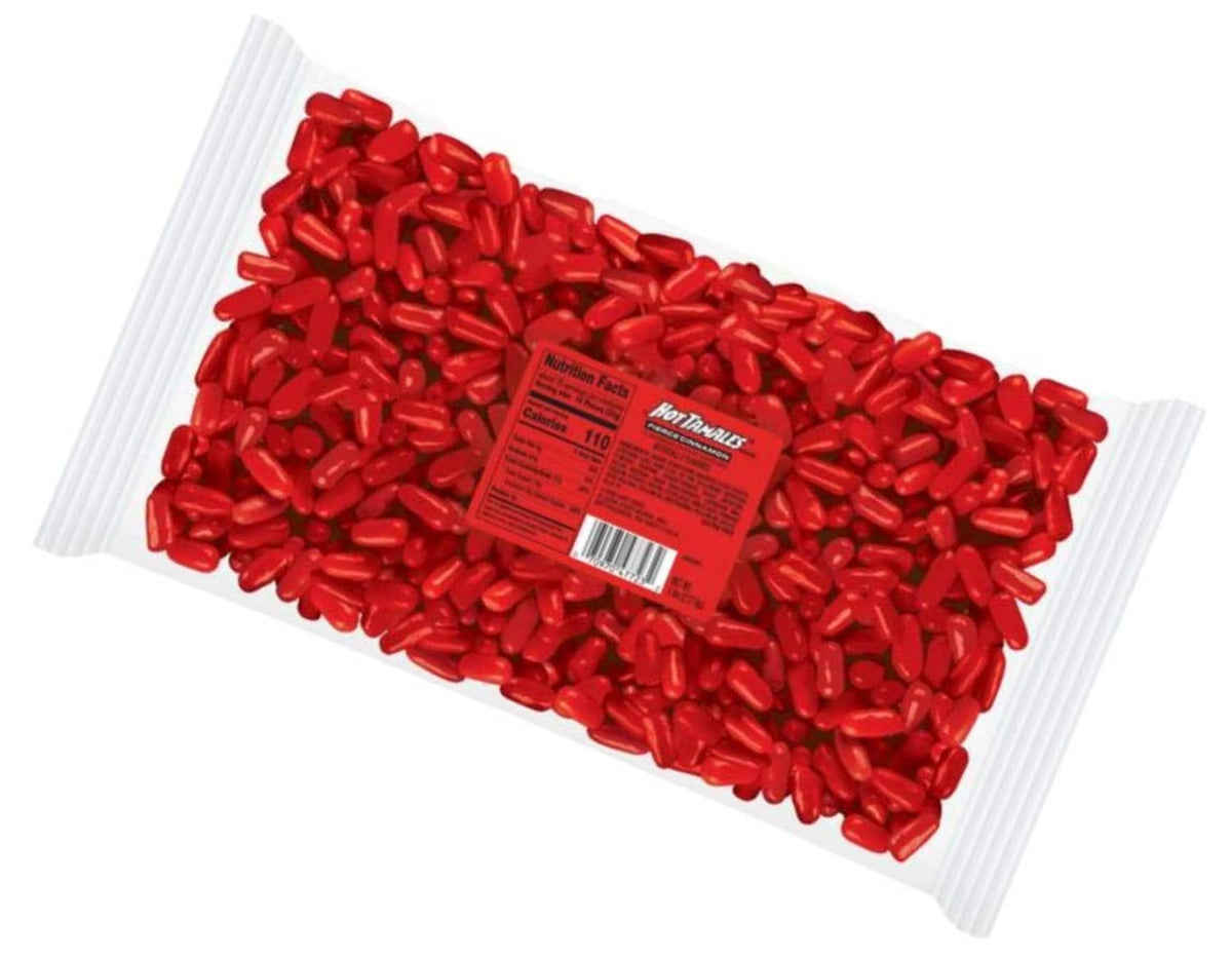 Hot Tamales cinnamon candies in a sealed pouch, red pieces with angled label visible