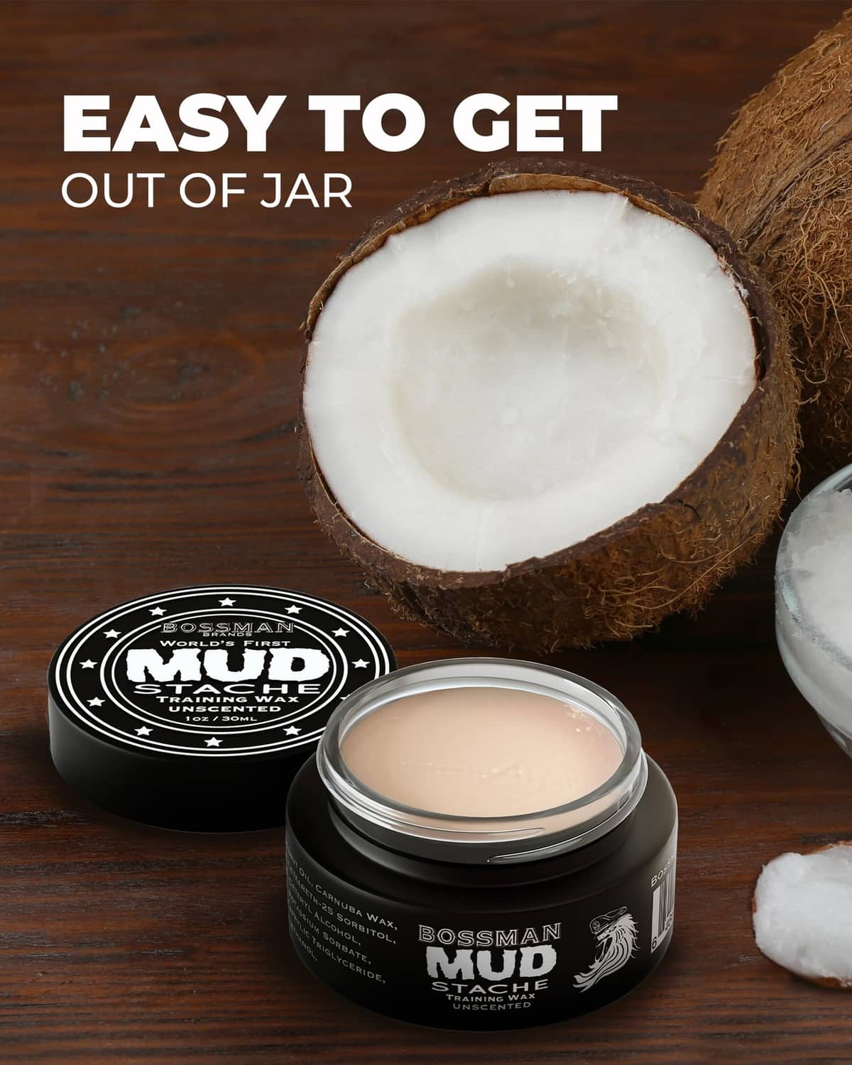 Mustache wax jar with open lid, beige balm inside, and a coconut shell on the side