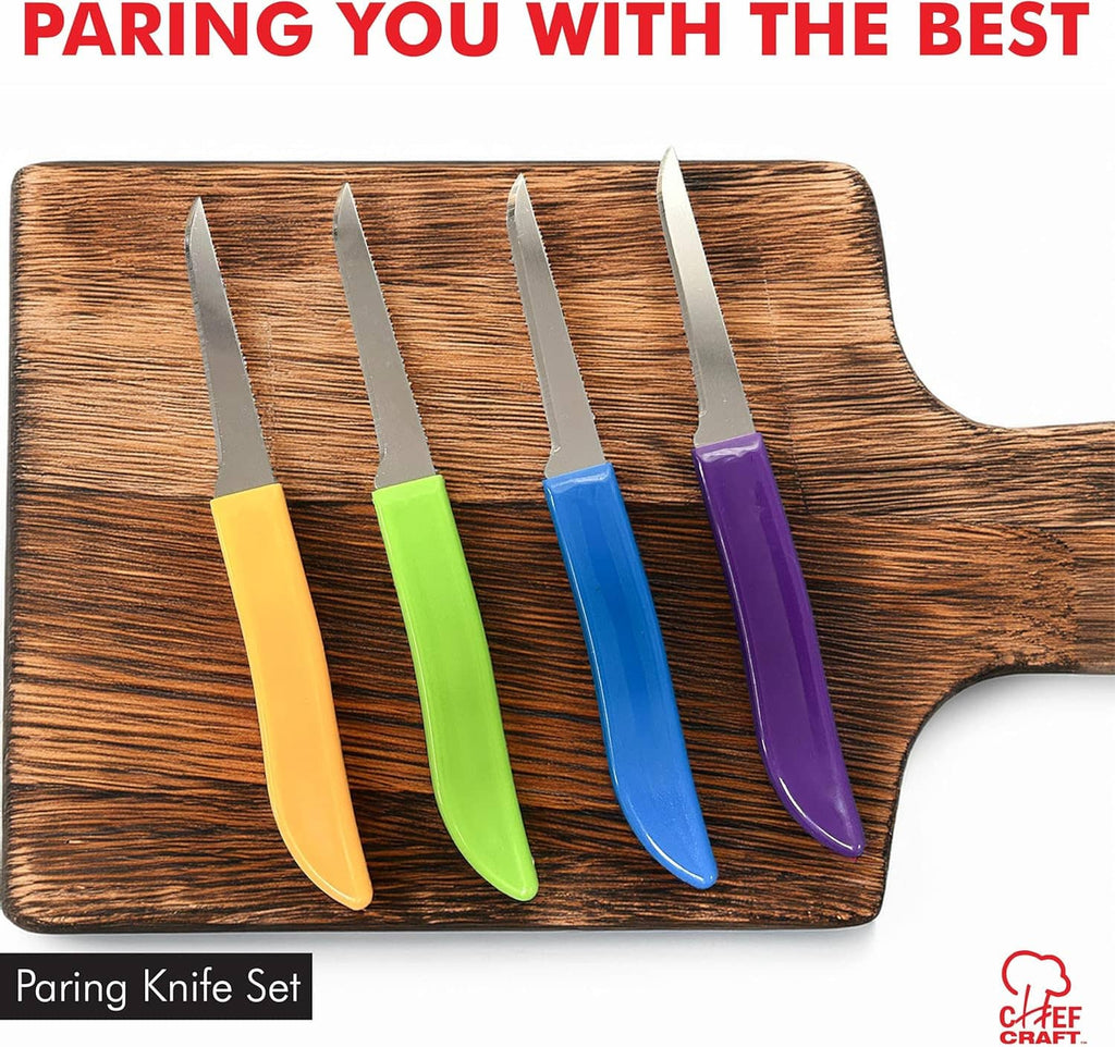 Paring knife set with four colored handles on a wooden cutting board