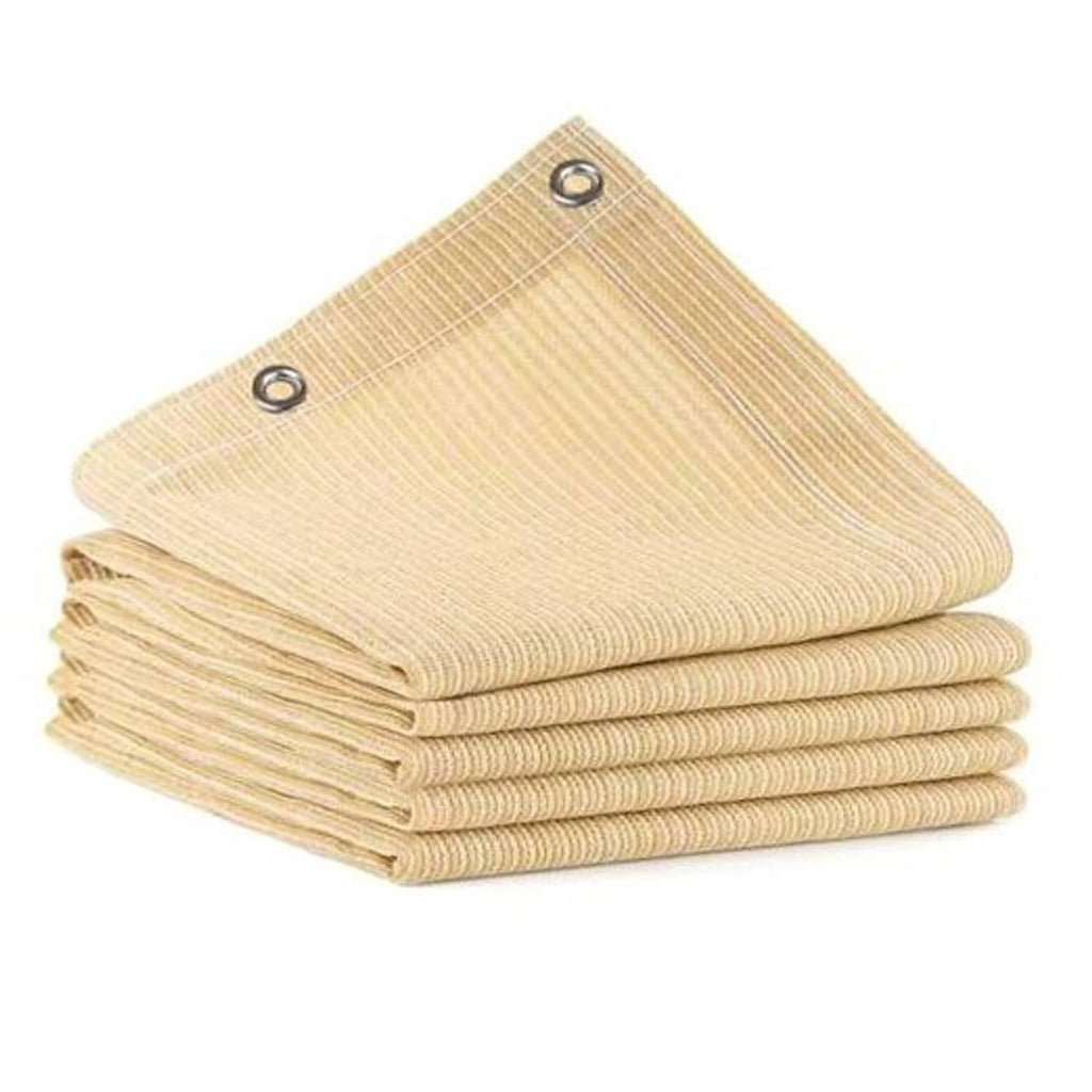 Beige shade cloth mesh with stacked folds and metal grommets at the corners