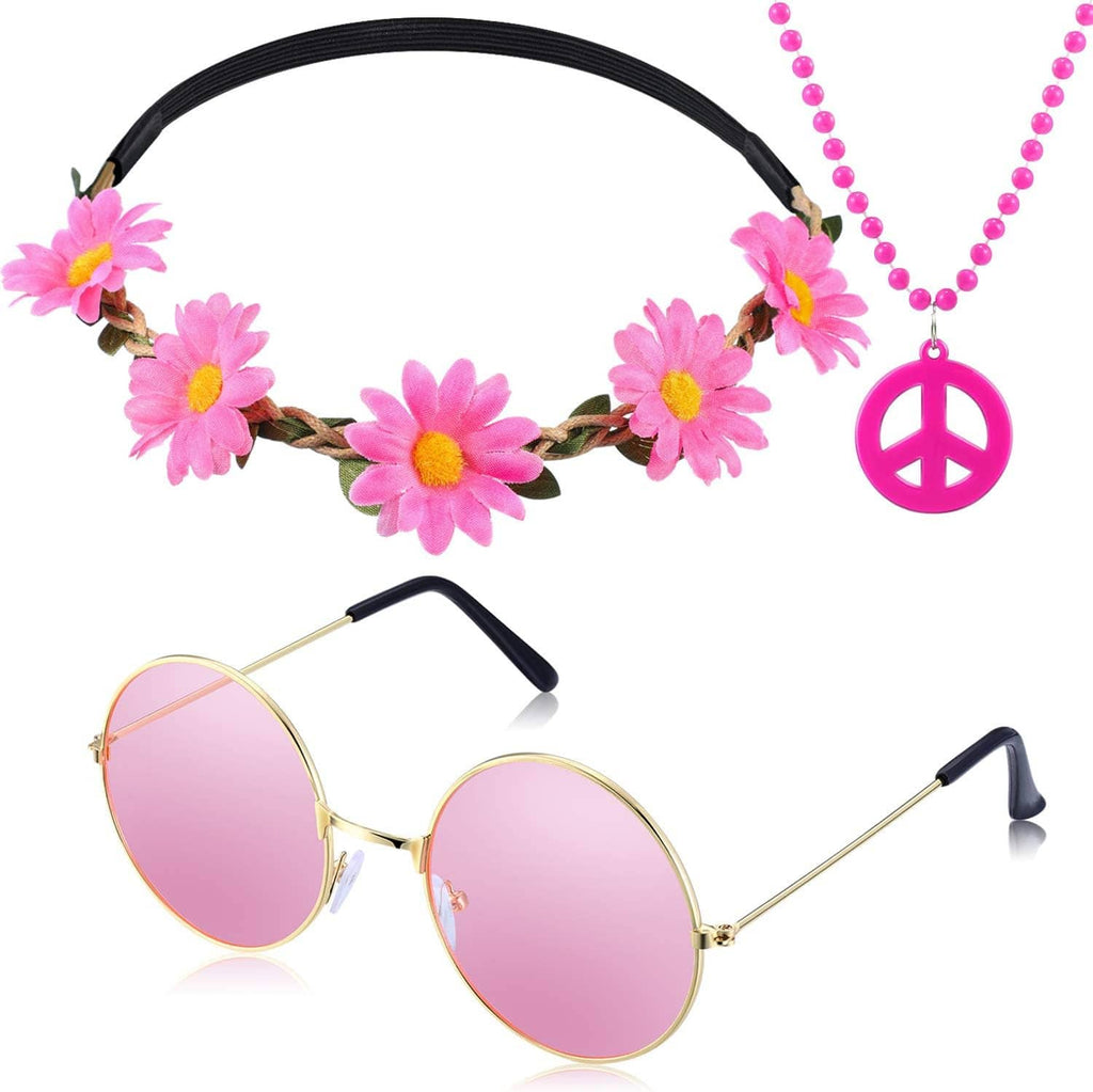 Hippie accessories on white: pink flower crown, peace pendant necklace, round pink-tinted sunglasses