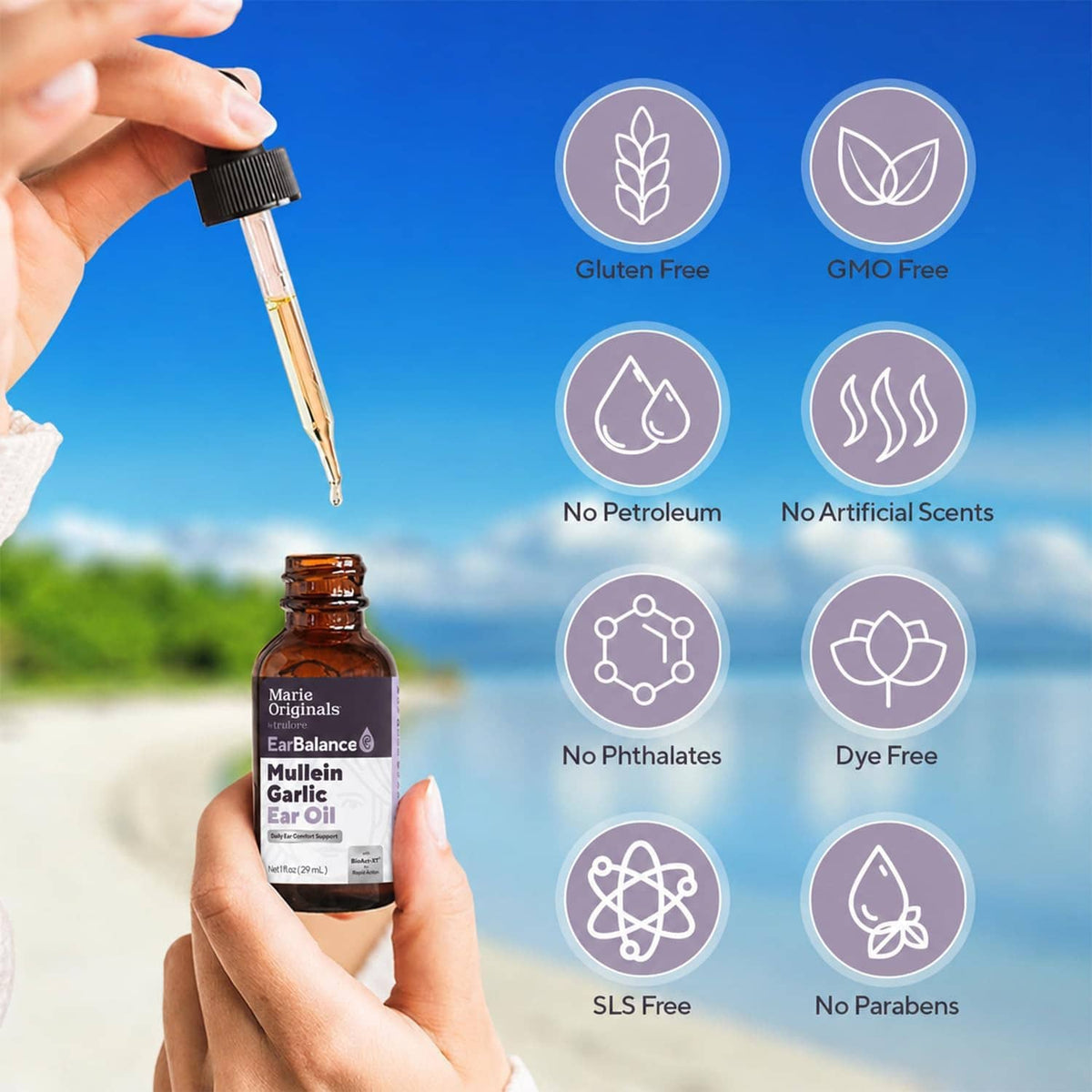 Mullein garlic ear oil drops: hand holding dropper above amber bottle with product labels