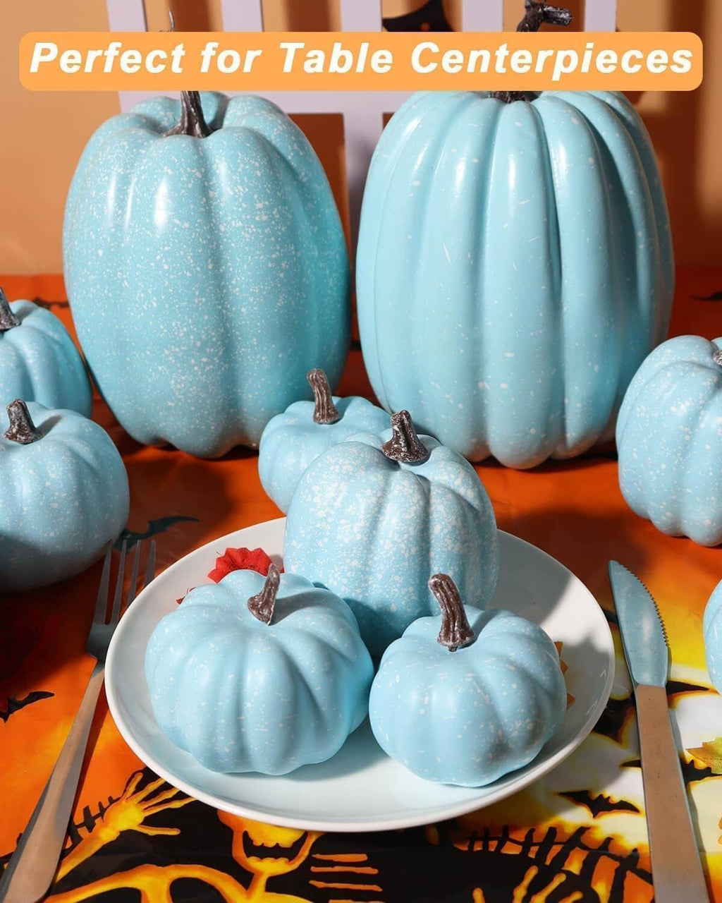 Light blue plastic pumpkins in assorted sizes with curled stems for table display