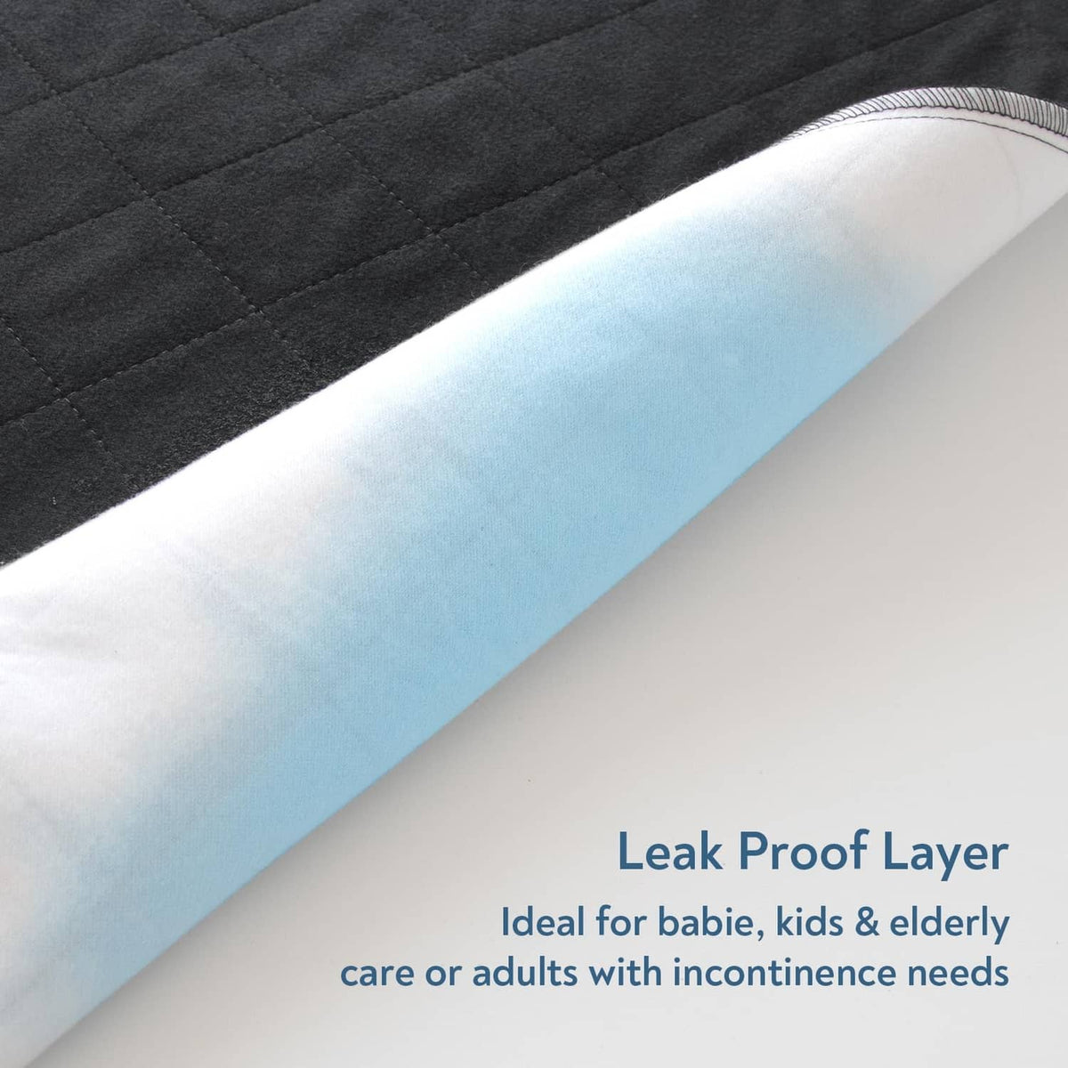 Black quilted underpad revealing a light-blue waterproof leakproof layer