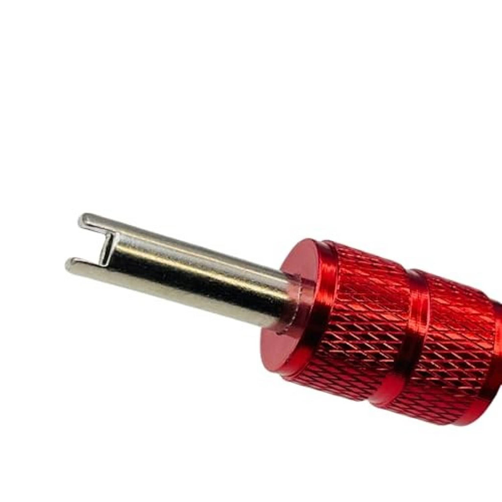 Valve core removal tool with red knurled grip and two metal prongs