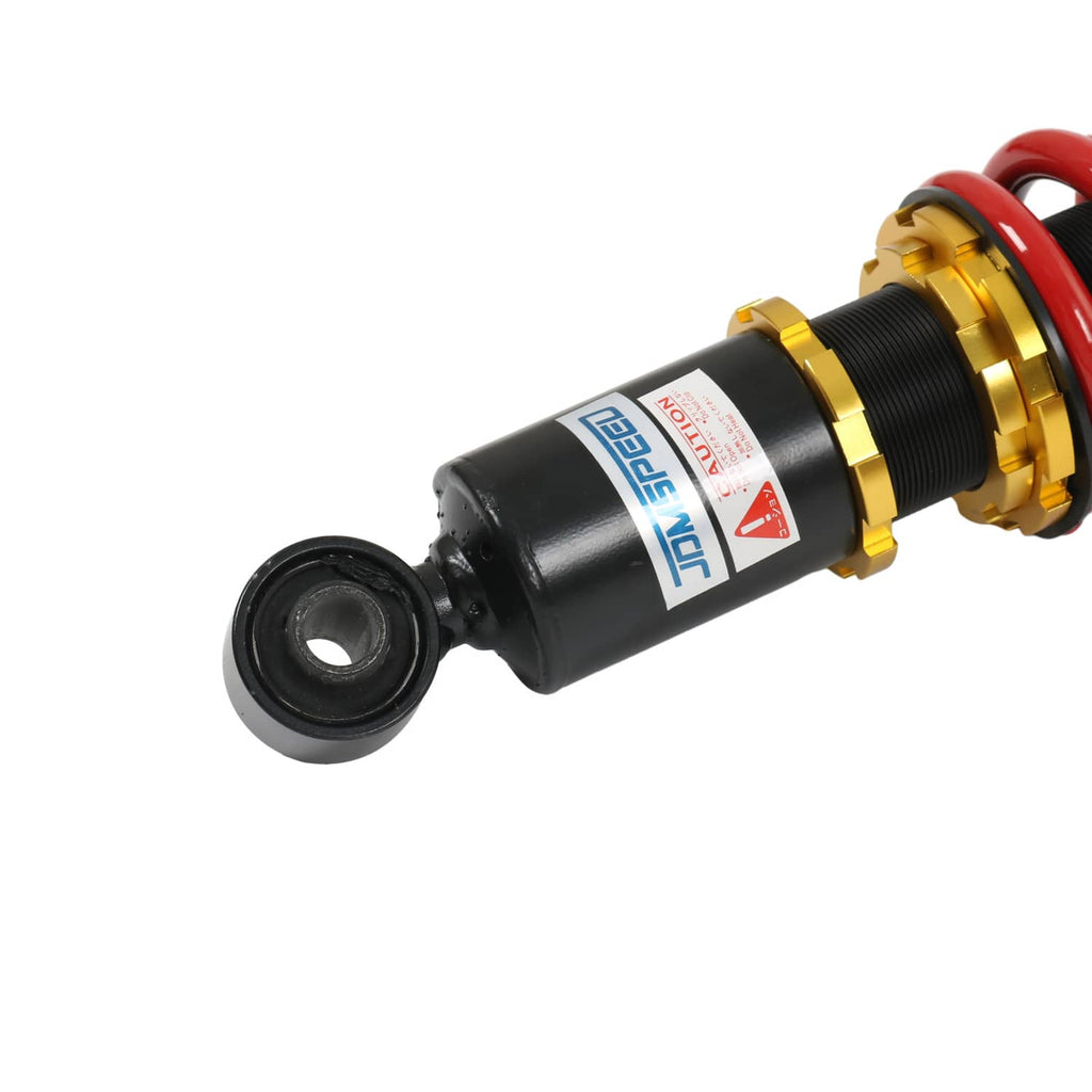 Black shock absorber end with rubber bushing and gold height adjuster ring