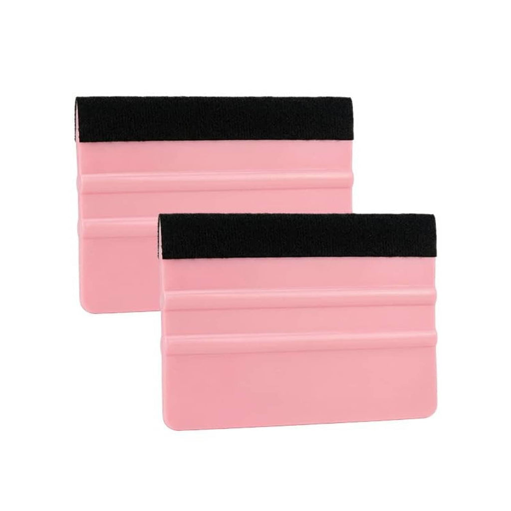 Two stacked vinyl squeegee tools, pink body with black felt edge