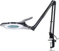 LED magnifying lamp with clamp, black articulating arm and round lens hood