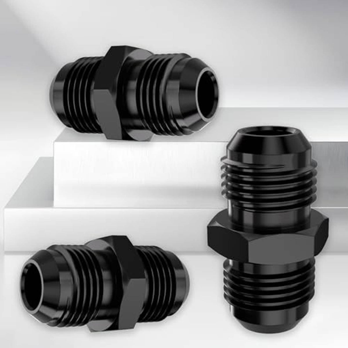 Two black AN10 flare straight fittings with flared threaded ends and hex mounting nuts.