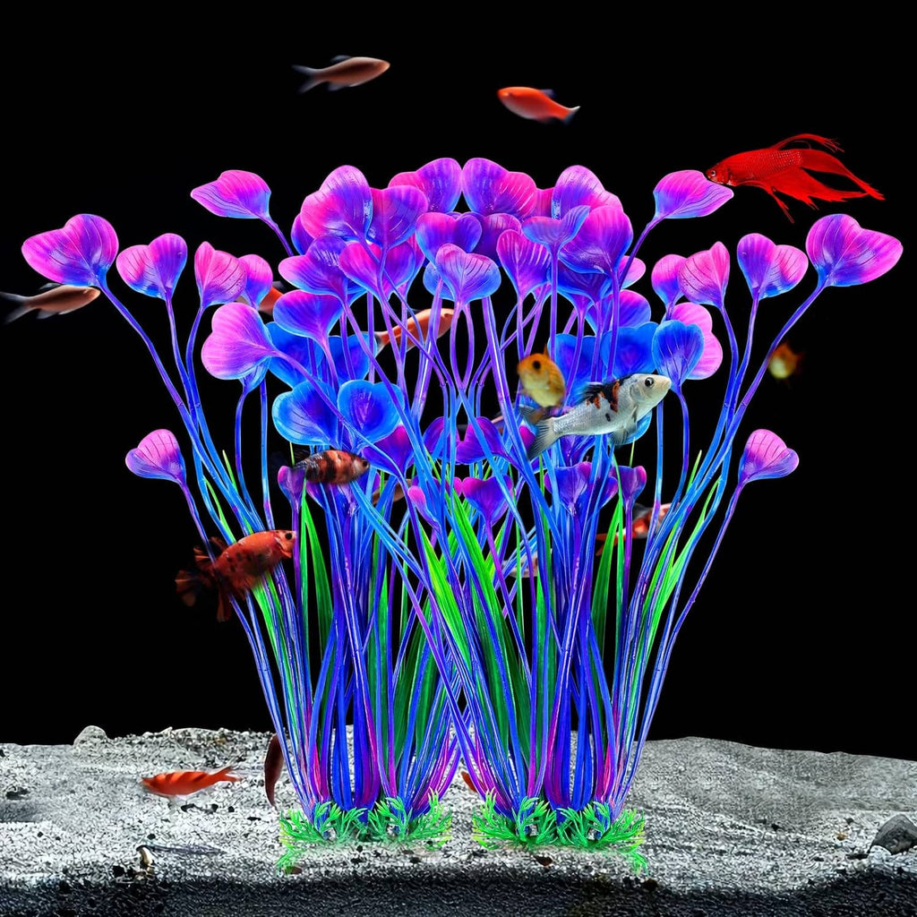 Purple-blue artificial aquarium plants with green base on aquarium gravel