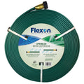 Flexon three-tube sprinkler hose coil, green with black brass connector