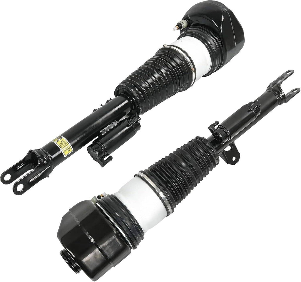 Front air suspension shock strut pair with visible piston ends and lower mounting hardware