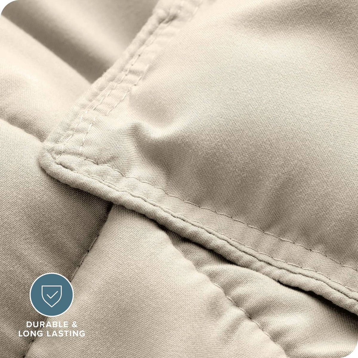 Close-up of cream down alternative comforter stitching and edge seam details