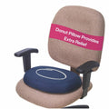 Navy molded donut cushion on upholstered chair seat and back