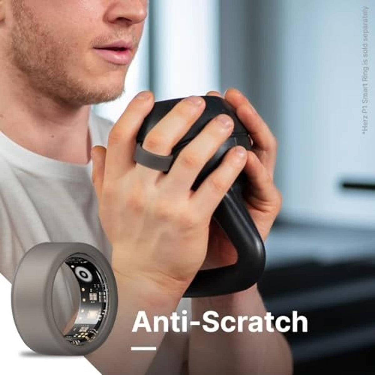 Black silicone ring protector cover worn over a smart ring on a hand